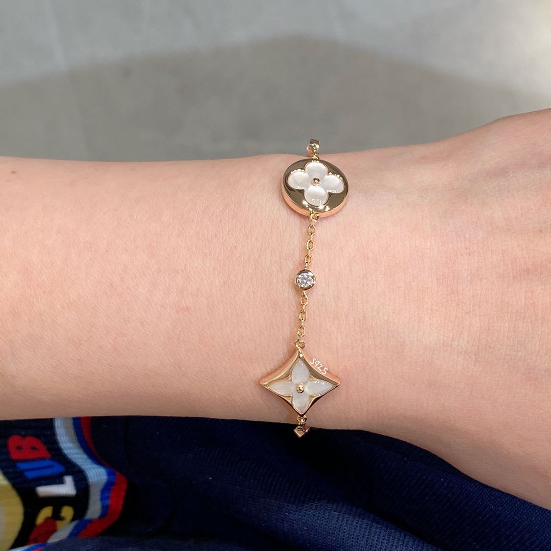 [⭐Aura]STAR AND SUN 4 MOTIF WHITE MOP PINK GOLD BRACELET