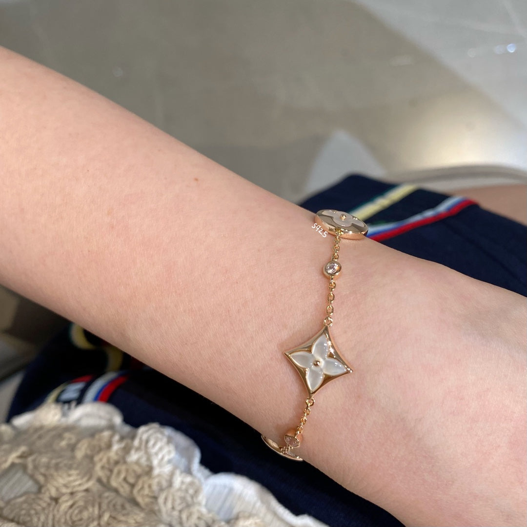 [⭐Aura]STAR AND SUN 4 MOTIF WHITE MOP PINK GOLD BRACELET